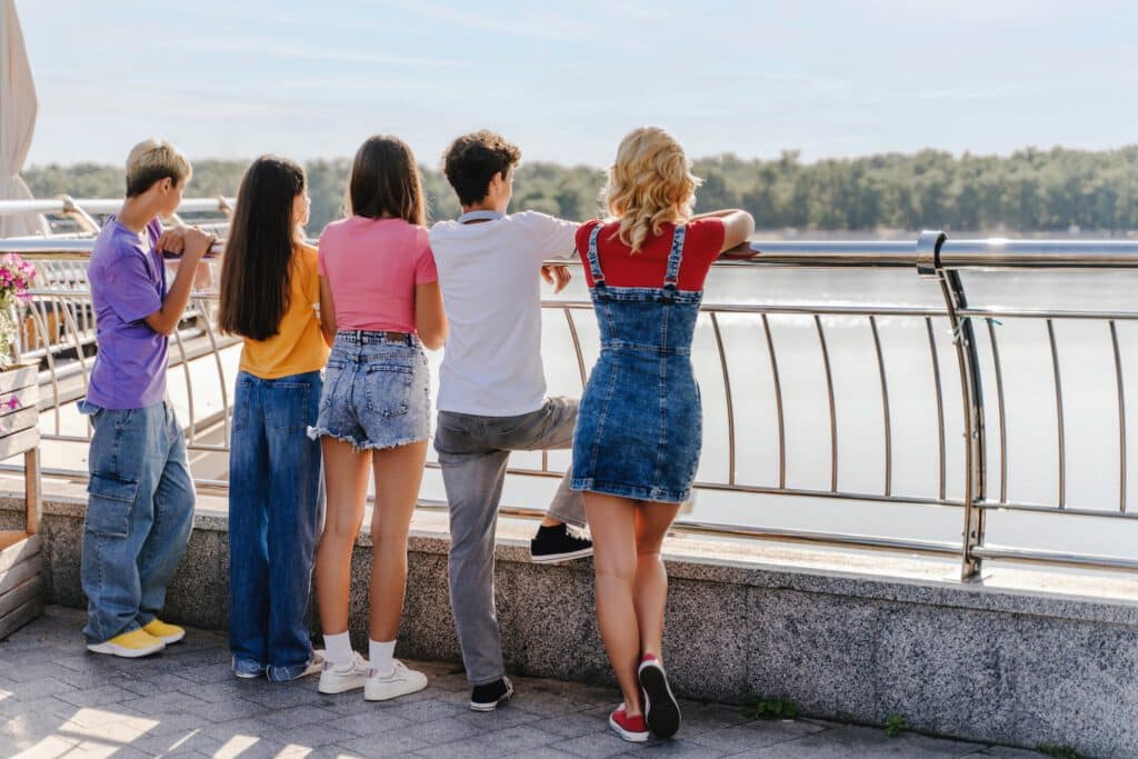 Group of teenage students walking together on a trip